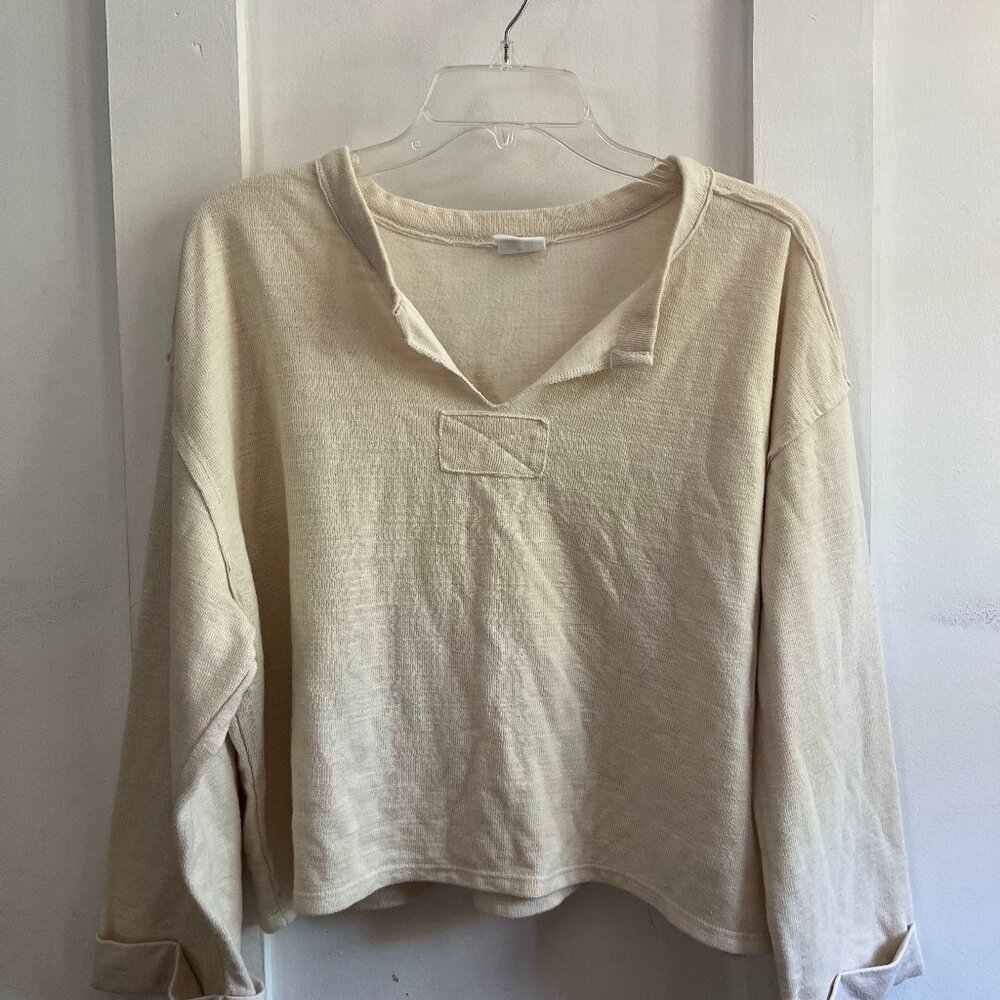 Relaxed cream sweater